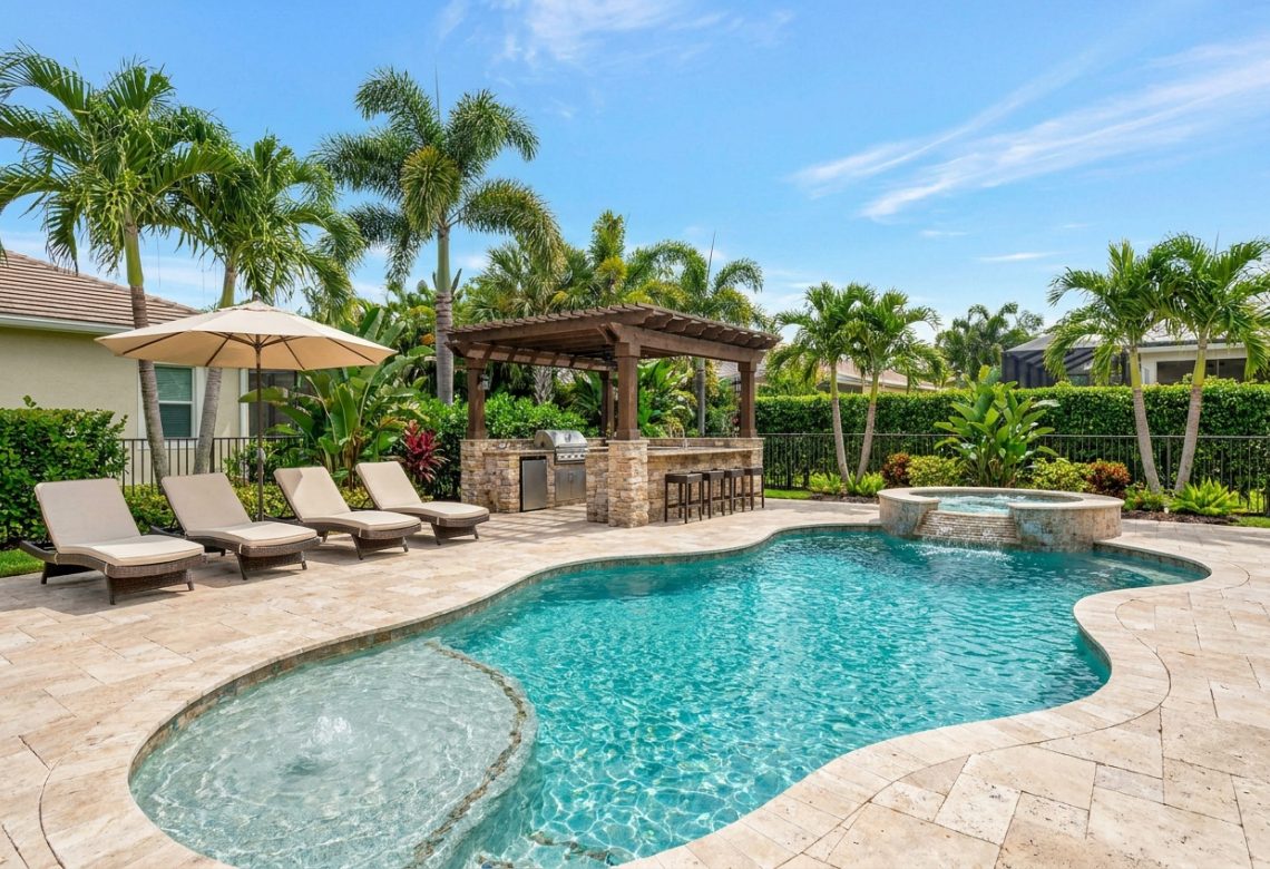 Pool and spa with outdoor kitchen